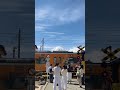 A railway crossing somewhere in Kawaguchiko with Mount Fuji and Fujikyuko Line's Naruto Boruto