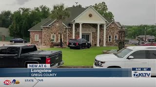 Gregg County law enforcement officials seen entering medical office of accused murderer’s son
