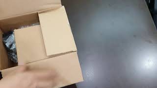 Zebra DS2208 open box, you can find a scanner + cable + stand and manual inside the box.