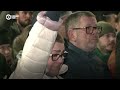 Lithuania Says Hammer Attack On Navalny Aide 'Well-Planned' After Blaming Putin