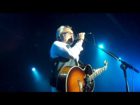 Mick Jones of Foreigner welcomes original members, Al Greenwood and Ian McDonald to the show at the Nokia Theater in Times Square in New York City.