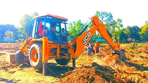 JCB vs a big tree root-JCB pushing  a big tree root-JCB video