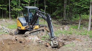 Removing big stump with John Deere 50G Mini Excavator