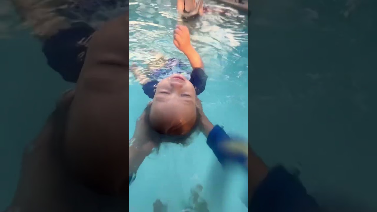 TEACHING CHILD TO SELF RESCUE IN POOL