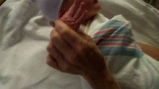 Mom and Dad's swaddling lesson