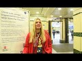 Dom Joly inspects commuters at Farringdon station on Christmas Jumper Day