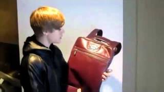 justin bieber shows  his LOUIS STEWART bags