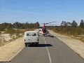 Вертолет на дороге
