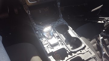 How to remove the center console bezel on a 2017 ford fusion