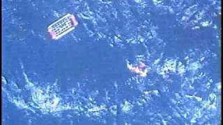 Coast Guard units rescue three from overturned sailboat