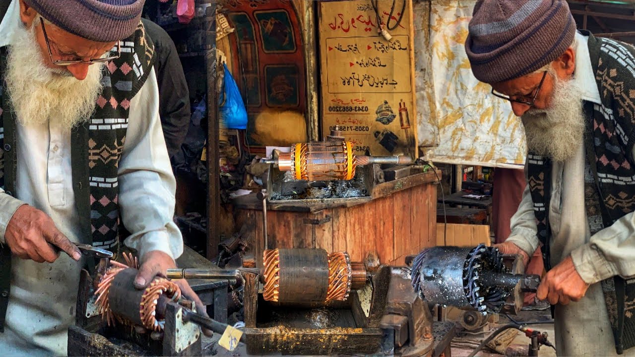 65 Old Expert Electrician Demonstrating The Rewinding Technique on a Truck Starter Motor Armature