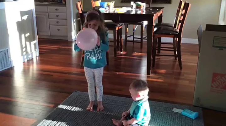 Maddie learned how to blow up balloons