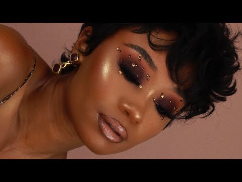 Video: Maquillaje de oro negro creativo Look