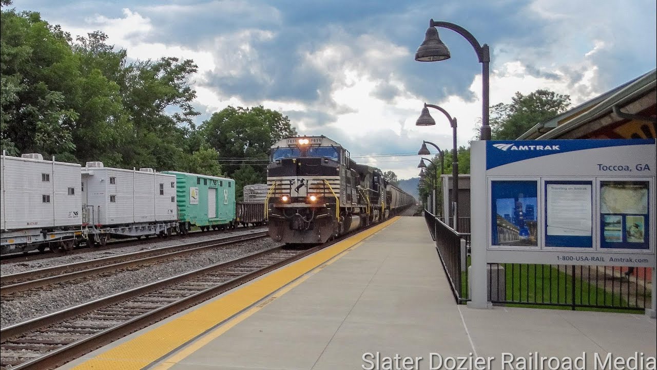 SD70ACC NS 1815 leads grain train NS 51R by the Amtrak Station in