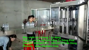Máy chiết rót đóng nắp 3 trong 1 chai nước tinh khiết 330,500ml - cty duphaco.com
