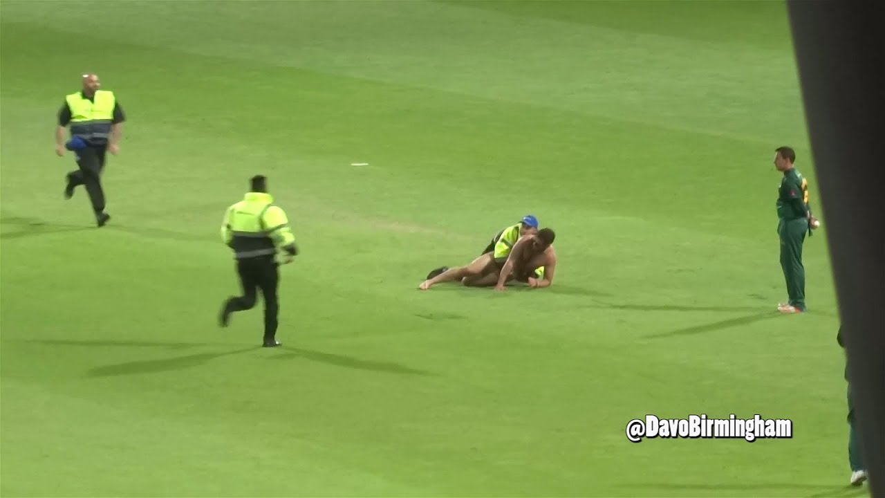 woman streaker tackled woman streaker tackled