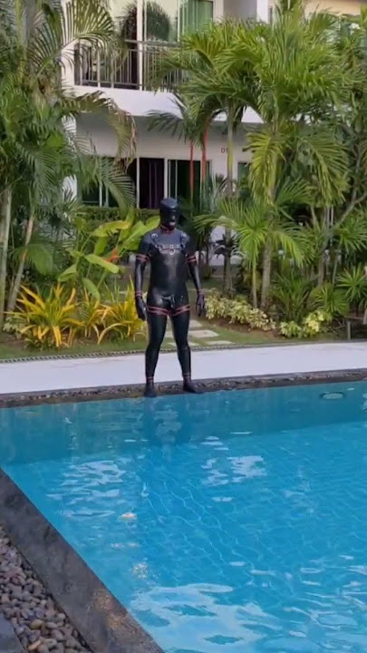 Swimming in latex suit 🏊