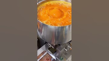 This is the process of cooking a large number of eggs using the tools that have been prepared.