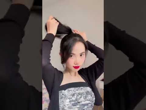 Video: Cách duỗi tóc bằng dây buộc tóc: 10 bước