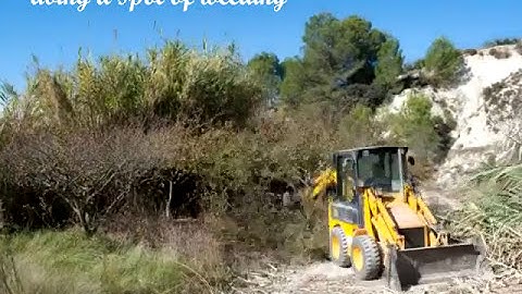 Time Lapse - JCB 1CX Clearing a plot of Plum trees.