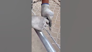 Installing Chain-Link Fencing: The Detailed Process of Securing the Mesh to the Pole