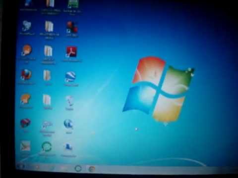 Vídeo: Como Diminuir Os ícones Do Windows 7