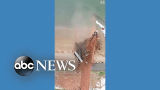 Landmark smokestack in Massachusetts demolished