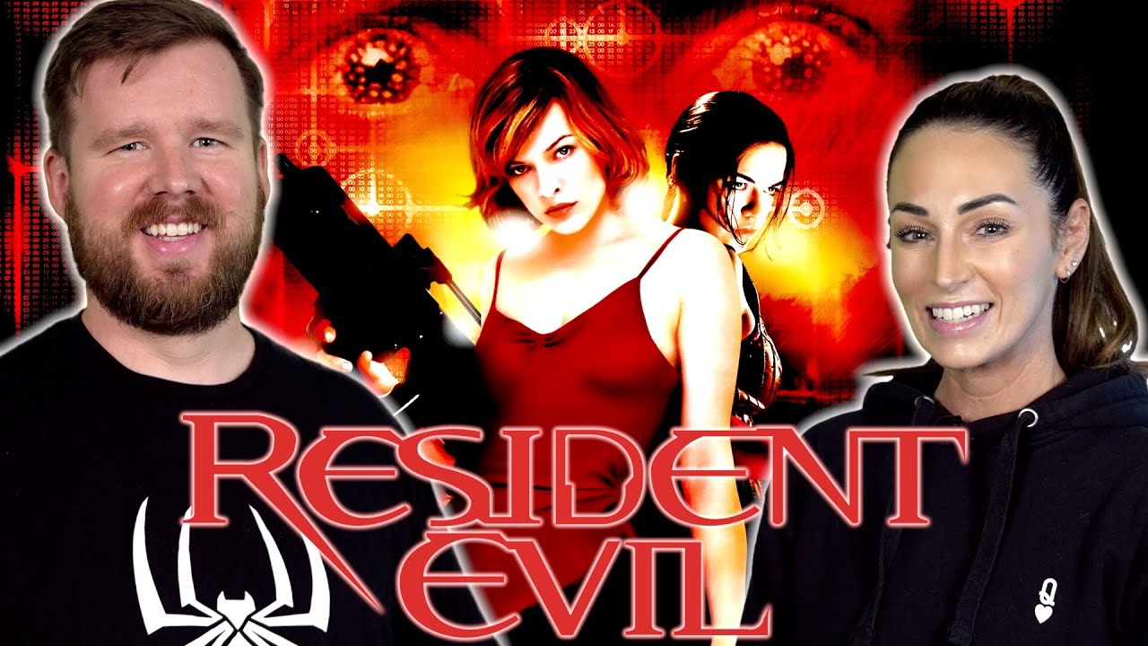 My wife watches RESIDENT EVIL for the FIRST Time || Movie REACTION