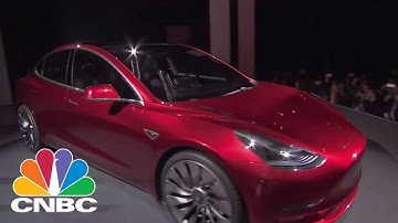 Elon Musk Shows Off First Production Tesla Model 3 | CNBC