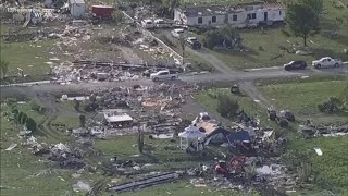 At least 18 dead after 2 dozen tornadoes