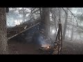 ALONE IN THE WILDERNESS PRIMITIVE BUSHCRAFT. COOKING OVER THE FIRE ON A STONE SLAB A STEAK ETC.