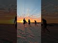 Friends Gather at Beach to Witness Beautiful Sunset - 1499495