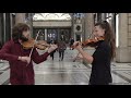 Violin Playing in the Halloween Night. Street Music. Italy