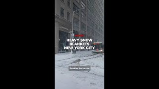 Heavy snow blankets New York City