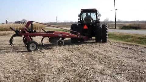 Deutz-Allis 9190 with Case International 6650 9 Shank Disc Chisel Plow