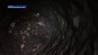 Archaeologists find 19th century well inside Boston sinkhole