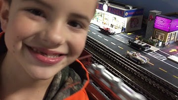 Kids Run their Lionel Train on Big Layout