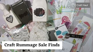 Craft rummage sale haul including stamps and cutting dies