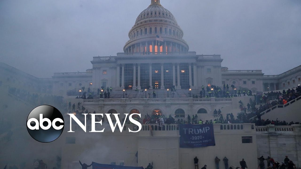 Siege at the Capitol, COVID mourning, a magical snowfall: World in Photos, Jan. 7