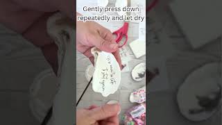 How to decoupage text paper onto shells