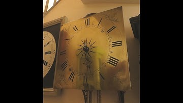 300yr old English clock on wall bracket