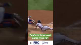 Conforto throws out runner