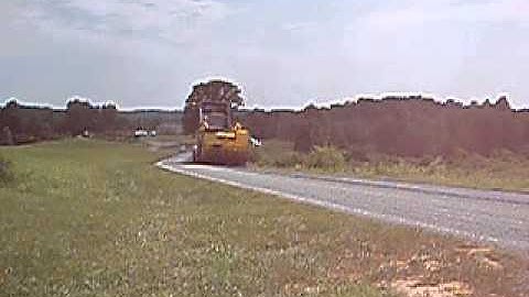 GEFFS BM624 WITH OUR 10 FT CCH HOPPER LAVING DOWN THE AGGREGATE