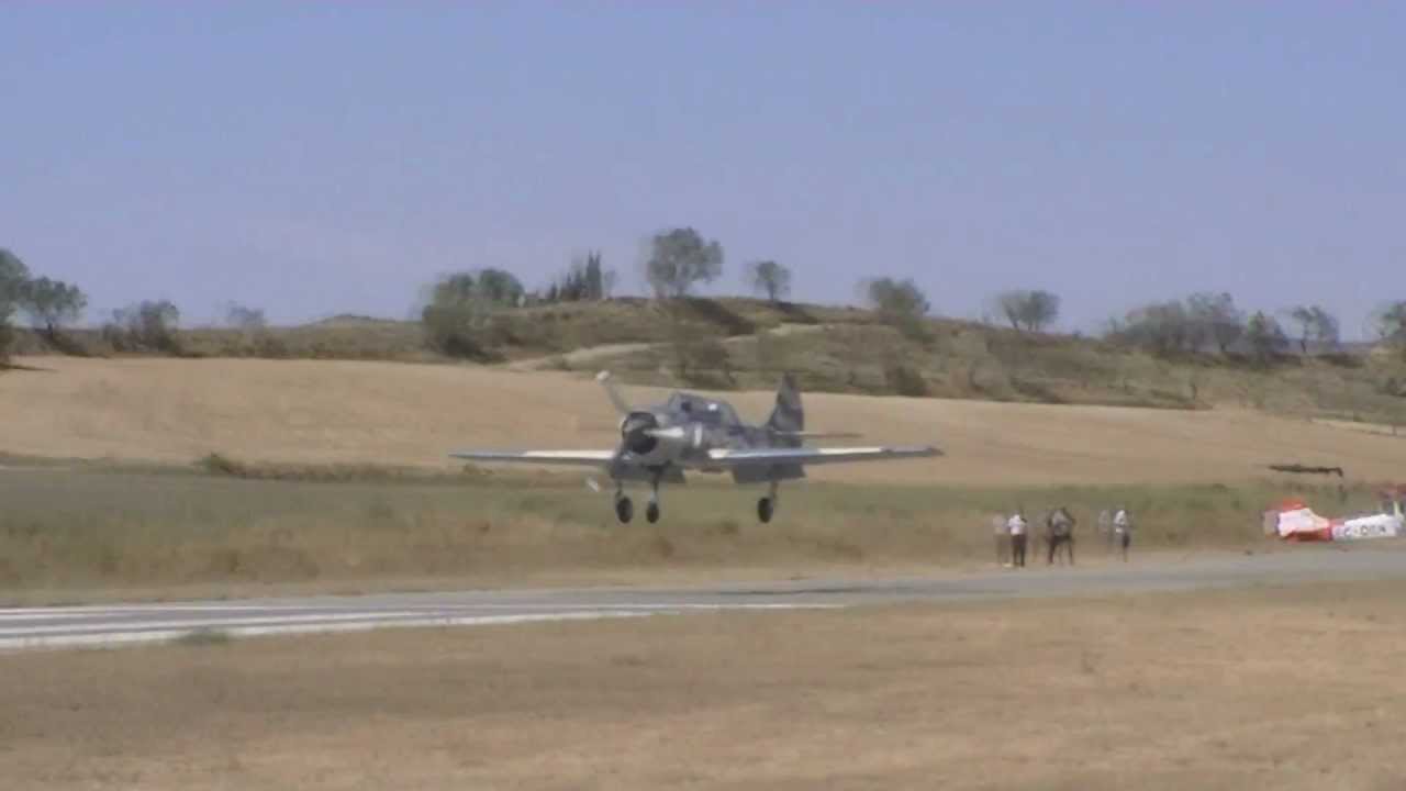 Yak-52 Low Pass and Landing in LEIG