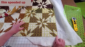 How to trim edges of a quilted quilt and get it ready for binding.
