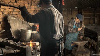 Blacksmith Making a Horse Shoe