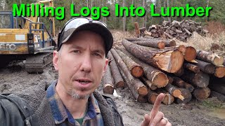 Portable Sawmill Milling Salvaged and Windfall Trees into Beams & Lumber