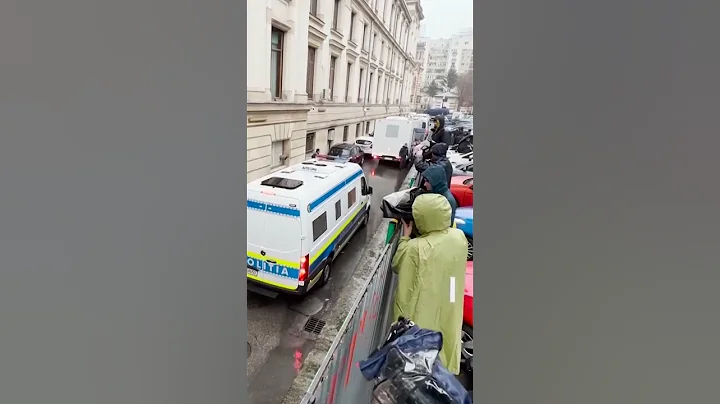 Andrew Tate and brother being escorted to police v...