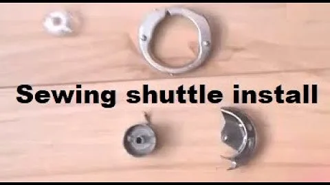 Sewing machine vertical shuttle install - placing back bobbin case hook race locking ring