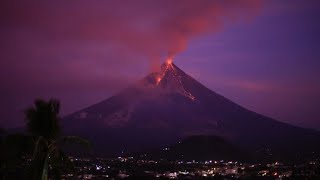 Philippines: Timelapse of Mayon volcano erupting during sunrise